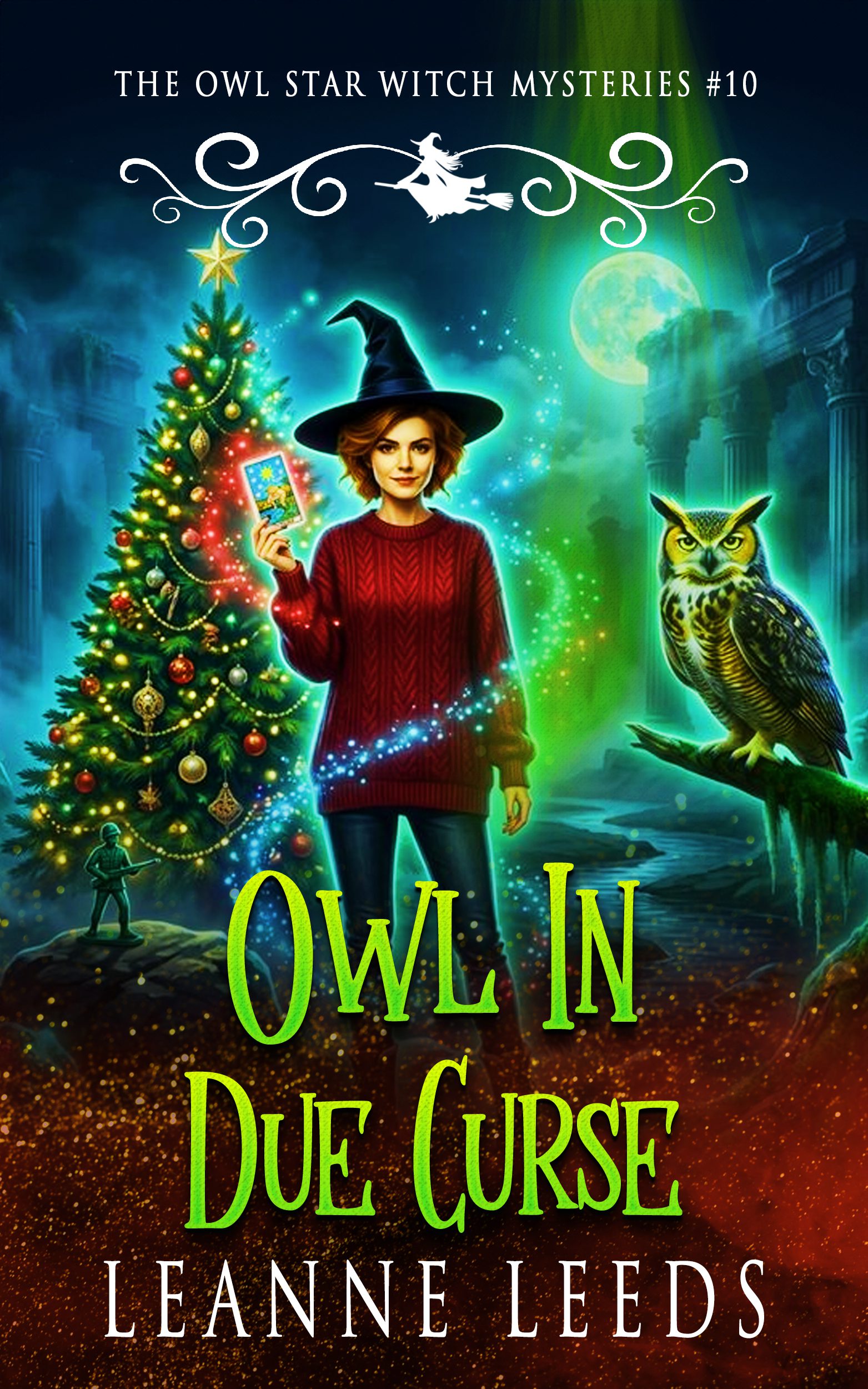 Cover of Owl In Due Curse by Leanne Leeds. Witch Astra and her owl Archie stand by a Christmas tree in the glowing, misty Greek Underworld.