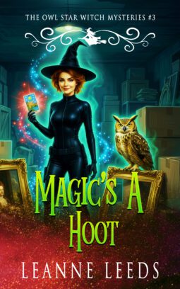 Book cover for 'Magic's A Hoot' by Leanne Leeds. An illustrated woman with dark hair stands in a room filled with colorful paintings and art supplies, accompanied by a small brown owl.